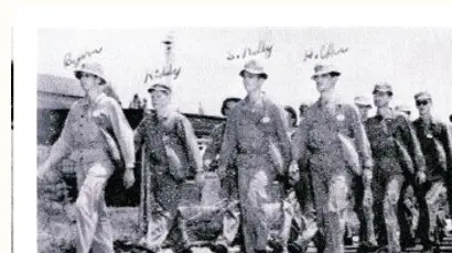 Soldiers in formation marching at Camp Murphy during World War II.